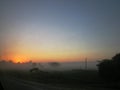 Sunrise on the horizon, early morning view on countryside