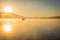 Sunrise at the lake Kawaguchiko,People fishing on a boat,silhoue Royalty Free Stock Photo