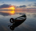 Sunrise on Lake Seliger with an old boat in the foreground Royalty Free Stock Photo