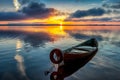 Sunrise on Lake Seliger with an old boat in the foreground.