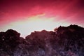 sunrise landscape behind a solid rock Royalty Free Stock Photo