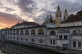 Sunrise landscape view of ancient city center of Ljubljana. Embankment of Ljubljanica River with colorful historic houses Royalty Free Stock Photo