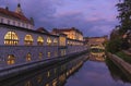 Sunrise landscape view of ancient city center of Ljubljana. Embankment of Ljubljanica River with colorful houses Royalty Free Stock Photo