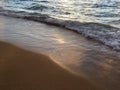 Sunrise Light on Pacific Ocean Waves on Beach in Kapaa on Kauai Island in Hawaii. Royalty Free Stock Photo