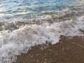 Sunrise Light on Pacific Ocean Waves on Beach in Kapaa on Kauai Island in Hawaii. Royalty Free Stock Photo