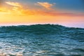 Sunrise light shining on ocean wave Royalty Free Stock Photo