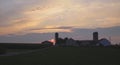 Sunrise Looking over an Amish Farm with Farm House Barn and Silos Royalty Free Stock Photo
