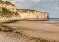 Sunrise with low clouds on Omaha Beach Normandy France Royalty Free Stock Photo