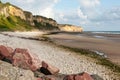 Sunrise with low clouds on Omaha Beach Normandy France Royalty Free Stock Photo