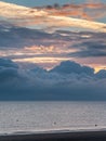 Sunrise with low clouds on Omaha Beach Normandy France Royalty Free Stock Photo