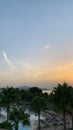 Sunrise in the Maldives. Views of palm trees, sun loungers, pool, neighboring island and the Indian Ocean Royalty Free Stock Photo