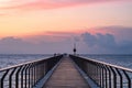 Sunrise in a mediterranean harbor. Pont del Petroli, Badalona, Barcelona, Catalonia, Spain