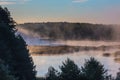 Sunrise and mist in beautiful lake in Lithuania Royalty Free Stock Photo
