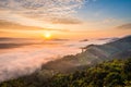 Sunrise and the mist in winter morning Royalty Free Stock Photo