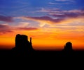 Sunrise at Monument Valley West and East Mittens Butte Royalty Free Stock Photo