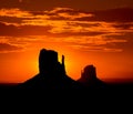 Sunrise at Monument Valley West and East Mittens Butte Royalty Free Stock Photo