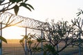 Sunrise in the morning in a place surrounded by barbed guardrails. There is a place of worship for Hindus in a vast expanse of Royalty Free Stock Photo