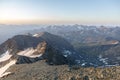 Sunrise morning view of a mountain range and cumulus clouds in the Austrian Alps. View from the way to Grossglockner rock summit, Royalty Free Stock Photo