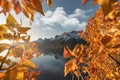 Sunrise on Mount Lawrence Grassi with autumn leaves reflection on Rundle Forebay reservoir Royalty Free Stock Photo