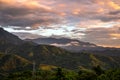 Sunrise at mountain. Dramatic moving cloud in nature landscape on sunshine morning