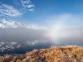 Sunrise on the mountain lake with fog Royalty Free Stock Photo