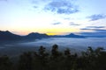 Sunrise on mountain in mist Royalty Free Stock Photo