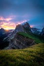 Sunrise at the mountain peaks of seceda in the dolomites.