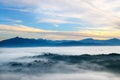 Sunrise in mountains, fog and cloud mountain valley landscape