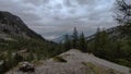 Sunrise in the mountains, karlsbader hutte, Ausrtian Alps, Lienz Dolomites view shelter on peack. Pinky sky with clouds, mirroring Royalty Free Stock Photo