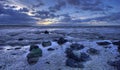 Sunrise and muddy beach Royalty Free Stock Photo