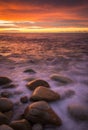 Colorful sunrise in Cala s`Aguia on the Costa Brava area