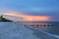Sunrise Naples Beach Florida background with space clouds and lightning Royalty Free Stock Photo
