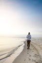 Sunrise in a nature. Sea and beatifull beach with girl. Silence. Natural background. Sunlight Royalty Free Stock Photo