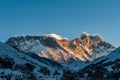 Sunrise on Nuptse, Lhotse and Mount Mt. Everest peaks with bird of prey at front. Trekking in Nepal Himalayas. EBC Everest base Royalty Free Stock Photo