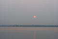 Sunrise obscured by Canadian Wildfire Smoke over the Rappahannock