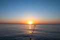 Sunrise on the ocean, sunset over the sea with buoys. Relaxation, pacification concept. Summer seascape, skyline. Beautiful nature