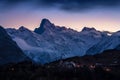 Sunrise on the Olan Peak in Valgaudemar with the village of Chauffayer. Ecrins National Park, Hautes-Alpes, Alps, France Royalty Free Stock Photo