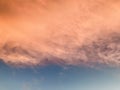 Sunrise with orange clouds and blue sky. Horizontal image. Royalty Free Stock Photo