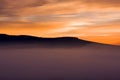 Sunrise in orange colours near Underberg in the Drakensberg mountain range in South Africa