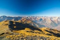 Sunrise over the Alps, the Massif des Ecrins 4101 m national park with glaciers, France. Clear blue sky, autumn colors, expansiv