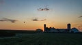 Sunrise Over an Amish Farm with Blues and Reds with Hot air Balloon Royalty Free Stock Photo