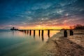 Sunrise over the beach and torpedo platform at Baltic Sea in Babie Doly, Gdynia. Poland