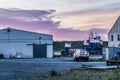 Sunrise over a boatyard in Ekuk Alaska on Bristol Bay.