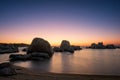 Sunrise over boulders at Cavallo Island in Corsica Royalty Free Stock Photo