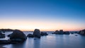 Sunrise over boulders at Cavallo Island in Corsica Royalty Free Stock Photo