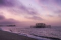 Sunrise over Brighton piers Royalty Free Stock Photo