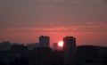 Sunrise over the city. The sun rises above the horizon Royalty Free Stock Photo
