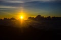 Sunrise over the clouds at dawn on a high mountain Royalty Free Stock Photo