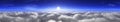 Sunrise over the clouds. Sunset over the clouds. The moon in the clouds. Panorama of clouds. Royalty Free Stock Photo