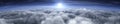 Sunrise over the clouds. Sunset over the clouds. The moon in the clouds. Panorama of clouds. Royalty Free Stock Photo